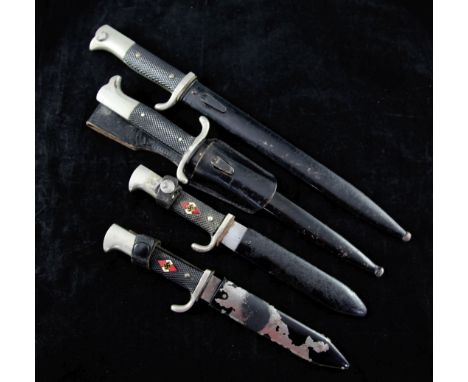 A German Third Reich Hitler Youth knife, by Tiger of Solingen, the black chequered grip inlaid with enamel HJ diamond logo, t