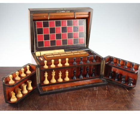 A Victorian burr walnut cased games compendium, with hinged lid and front doors opening to reveal a fitted interior, with lif