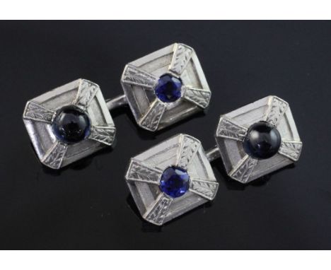 A pair of platinum and sapphire octagonal cufflinks, set with cabochon and round cut stones with a total weight of 4.15ct, gr