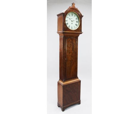 An early 19th century mahogany thirty hour longcase clock, with painted circular Roman dial, 6ft 9in.