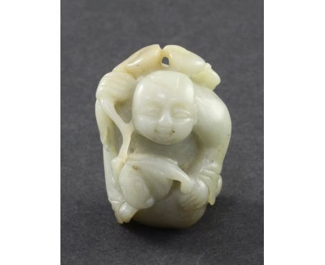 A Chinese celadon jade figure of Liu Hai, 19th century, with a cord of cash suspended across his back, the figure of a bat be