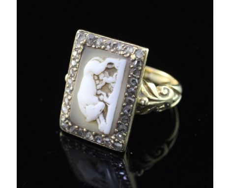 An antique gold, cameo and rose cut diamond set ring, the late 18th/early 19th century cameo carved with Romulus and Remus su