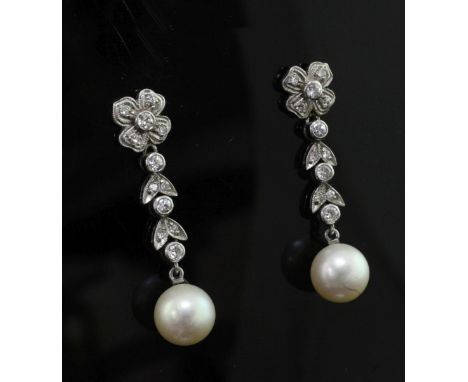 A pair of mid 20th century white metal, cultured pearl and diamond set drop earrings, of foliate design, unmarked, 1.5in.