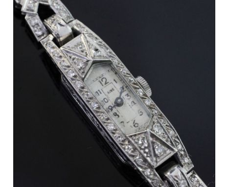 A lady's 1920's/1930's white gold and diamond set cocktail watch, with Favre Leuba movement and Arabic dial inscribed Aine, t