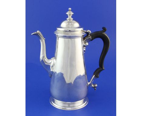 A mid 18th century silver coffee pot by Richard Gurney & Thomas Cook?, of tapering cylindrical form, with ebonised scroll han