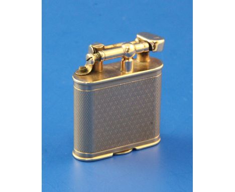 A late 1920's engine turned 9ct gold Dunhill Unique petrol lighter, 1.75in.