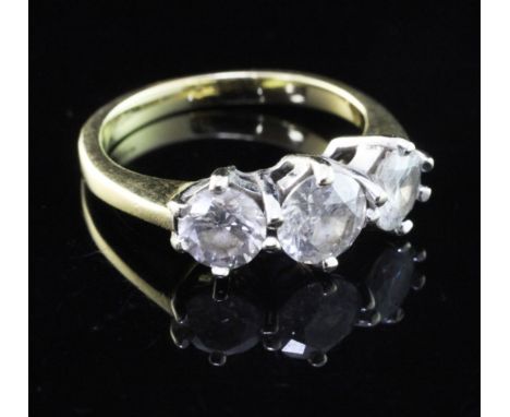 An 18ct gold and three stone diamond ring, the stones with an approximate total weight in excess of 1.00ct, size J.