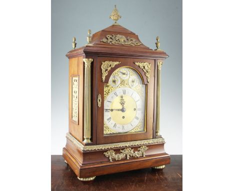 An Edwardian ormolu mounted mahogany chiming mantel clock, with architectural case and arched Roman dial with chime / silent,