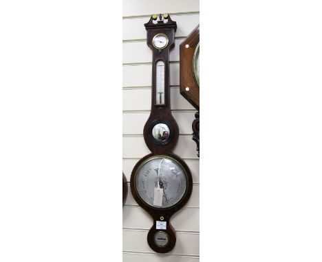 A Regency strung mahogany wheel barometer, with silvered hygrometer, thermometer, mirror and level, signed D. Rivolta, Edinbu