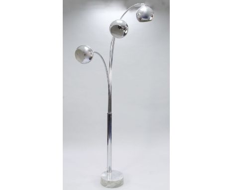 A 20th century chrome triple arc floor lamp, with ball shades and circular grey marble base, probably Italian, H.7ft 2in.