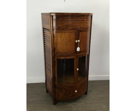 STARBAY ROSEWOOD BOW FRONT DRINKS CABINET,the top lifting to reveal fitted interior with doors and drawers with slatted sides