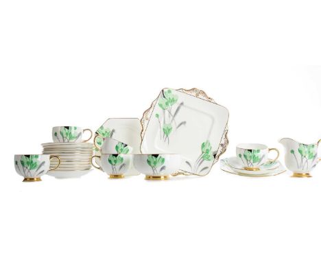 ART DECO TWELVE SETTING PART TEA SERVICE BY PARAGON,painted in enamels with floral pattern, comprising two sandwich plates, t