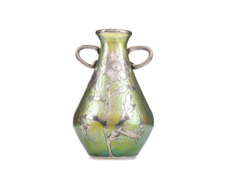 ATTRIBUTED TO LOETZ, ART NOUVEAU SILVER OVERLAID IRIDESCENT GLASS VASE,of tapered form, twin-handled with sunflower motif, un