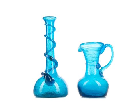 CLUTHA GLASS BY JAMES COUPER &amp; SONS OF GLASGOW (1850-1922),a small blue oil flask/ewer, 10.8cm high, and a slender bottle