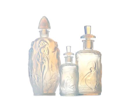 THREE FRENCH GRADUATED OPALESCENT GLASS PERFUME BOTTLES BY SABINO,all moulded with maidens in relief, signed Sabino Paris, wi