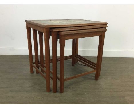 NEST OF THREE DANISH TILE-TOPPED TEAK TABLES,by Møbelfabrieken Toften, the tiles decorated with birds, stamped to underside, 