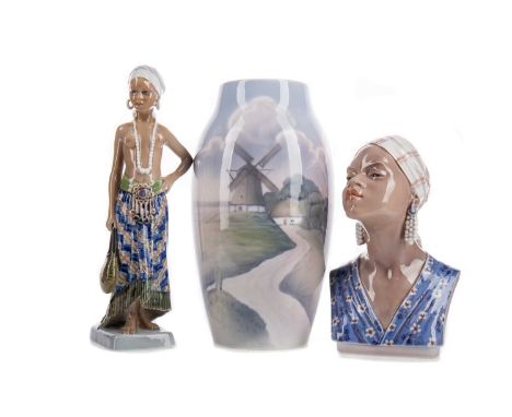 TWO DAHL-JENSEN POTTERY FIGURES,the first a full female figure, no. 1117, 25.7cm high, the second a bust, no. 1211, together 