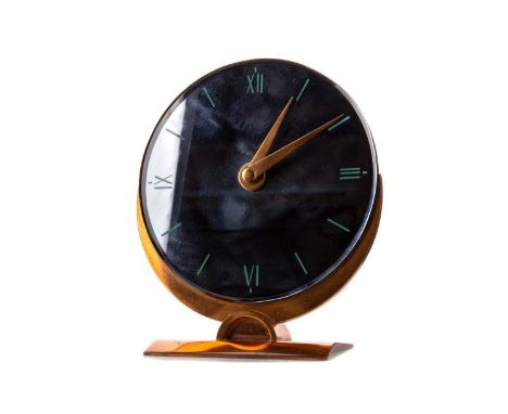 MANTLE CLOCK OF ART DECO DESIGN BY MERCER,the smoked mirrored dial set with Roman numerals, with copper coloured hands and ba