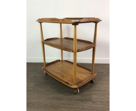 ERCOL GOLDEN ELM TEA TROLLEY,76cm x 47cm x 72cmCondition good to fair. The piece is tight. There is wear to the top level, al