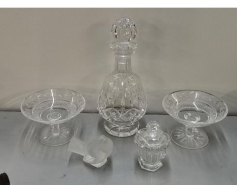 A Waterford crystal decanter together with two Waterford tazzas, a Lalique robin (with chip) and a Baccarat pot and coverLoca