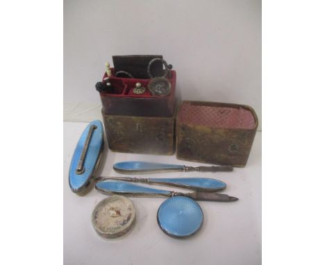 Silver and enamel manicure items along with 'Ladies Companion' leather bound box containing tape measure and other items 
