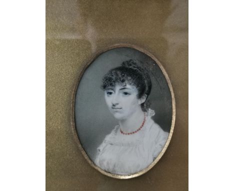 A 19th century miniature portrait of a lady on ivory, set in a gilt wood frame Location: 6.2 