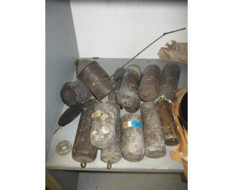 A quantity of long case clock weights and a pendulumLocation: G 