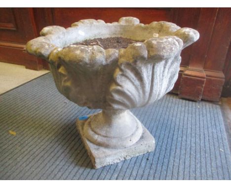 A stoneware garden planter decorated with acanthus leaves, 43cm h x 50cm w 