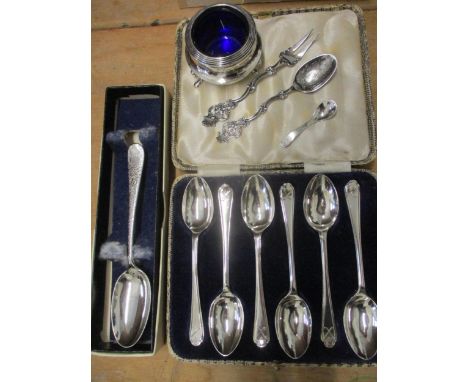 A set of six cased silver teaspoons 80.4g, together with a silver christening spoon with 'Nora' engraved to the handle 29.2g,