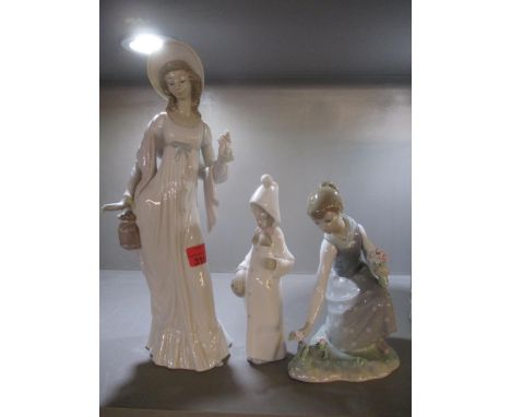 Three Lladro figures of females A/F to include a dainty lady, 35cm highCondition: damage to the fingers of dainty lady and th