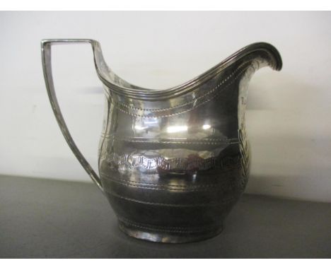 A Hester Bateman and Family silver cream jug, 8cm high, 77.6gLocation: porter 