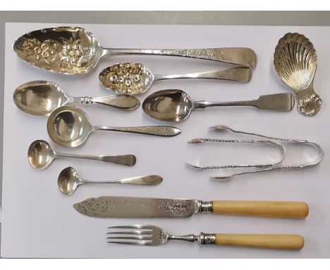Silver to include two Georgian berry spoons, two Georgian teaspoons, a Victorian teaspoon, a caddy spoon in the form of a she