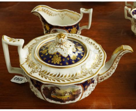 A RIDGWAY PORCELAIN PART TEA AND COFFEE SERVICE (45)Circa 1825 Each piece painted with a landscape vignette against a cobalt-