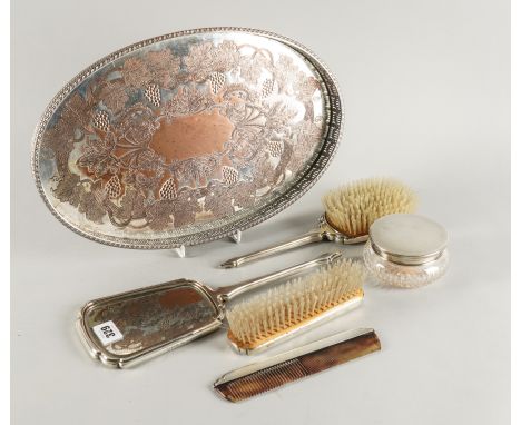 A SILVER MOUNTED FOUR PIECE DRESSING SET, A POWDER BOWL AND A PLATED TRAY (6)The four piece dressing set comprising; a hand m