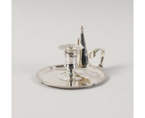 A GEORGE III SILVER CHAMBER CANDLESTICKDecorated with a gadrooned rim, with a detachable snuffing cone and sconce, London 177