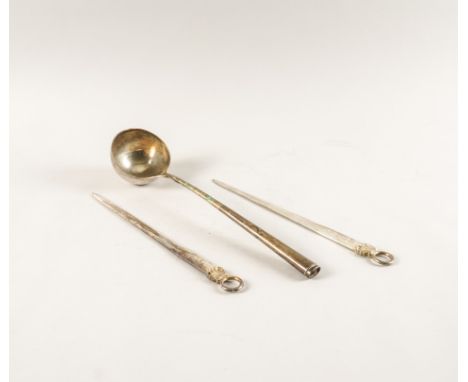 A SILVER LADLE AND A PAIR OF SILVER PAPER KNIVES (3)The ladle with a tapered handle (loaded), London 1988, the pair of paper 