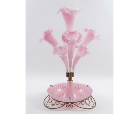 A LATE VICTORIAN PINK GLASS TRUMPET VASE CENTREPIECE OR EPERGNELate 19th Century  The central vase surrounded by six others, 