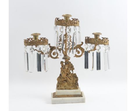 A  VICTORIAN ROCOCO REVIVAL GILT-METAL  THREE LIGHT CANDELABRUMMid 19th Century The central column a decorative scene of a co