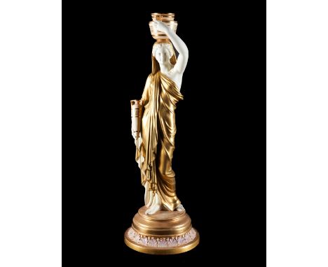 A TALL ROYAL WORCESTER FIGURE OF A GRECIAN WATER-CARRIERCirca 1919 Decorated in `shot enamels', modelled as a young woman sta