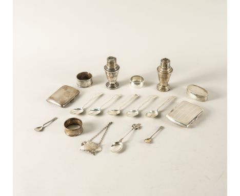 A GROUP OF SILVER AND SILVER MOUNTED WARES (17)Comprising; three napkin rings, two cigarette cases, an oval box, a decanter l