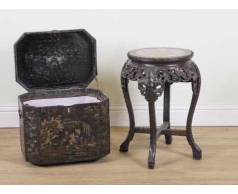 A CHINESE CARVED HARDWOOD CIRCULAR JARDINIERE STAND (2)With inset marble top, 44cm diameter; 61cm high, and a Victorian black