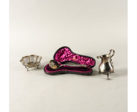 A SILVER SUGAR SIFTING SPOON AND TWO FURTHER ITEMS (3)The sifting spoon as converted from a sauce ladle, probably London 1817