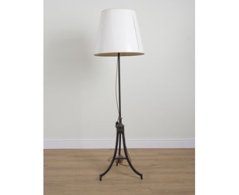 A REGENCY STYLE JAPANNED METAL AND GILT-DECORAGED TRIPOD FLOOR STANDING LIGHTEarly 20th Century  150cm high, excluding shade