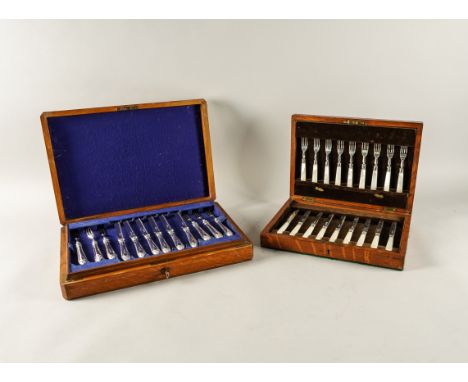 TWO CASED SETS OF FLATWAREComprising; a set of nine pairs of dessert or fruit knives and forks, having mother-of-pearl handle