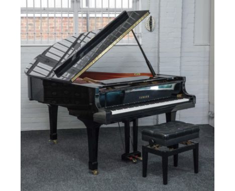 YAMAHA; A HIGH GLOSS EBONISED C3 IRON FRAMED OVERSTRUNG BABY GRAND PIANOSerial number 3370680. 144cm wide; 180cm long;Conditi