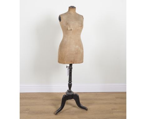 A POSSIBLY FRENCH DRESS MAKER'S OR TAILORS’S MANNEQUINMounted on an ebonised tripod stand, 153cm high