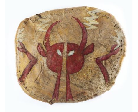 A NATIVE AMERICAN PLAINS INDIANS PAINTED HIDE WARRIOR SHIELD AND ANTELOPE FOOT AMULET (2)Possibly Early 20th Century  Of conc
