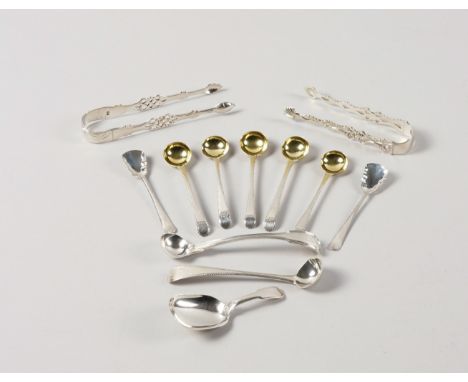 A GROUP OF SILVER FLATWARE (12)Comprising; two pairs of George III sugar tongs, with cast and pierced decoration, five feathe