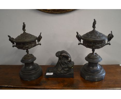 Two Metal Urns and a Sculpture of s Seated Nude 