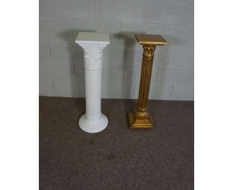 Two jardiniere stands, both in the form of Classical columns, one white ceramic, 86cm high, the other gilt painted wood, 87cm